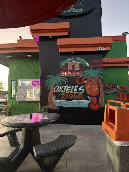 Panza Verde restaurant exterior with colorful mural