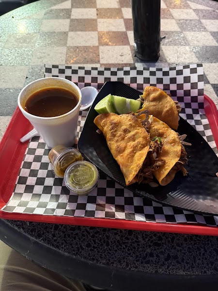 Birria tacos with consomé dipping sauce